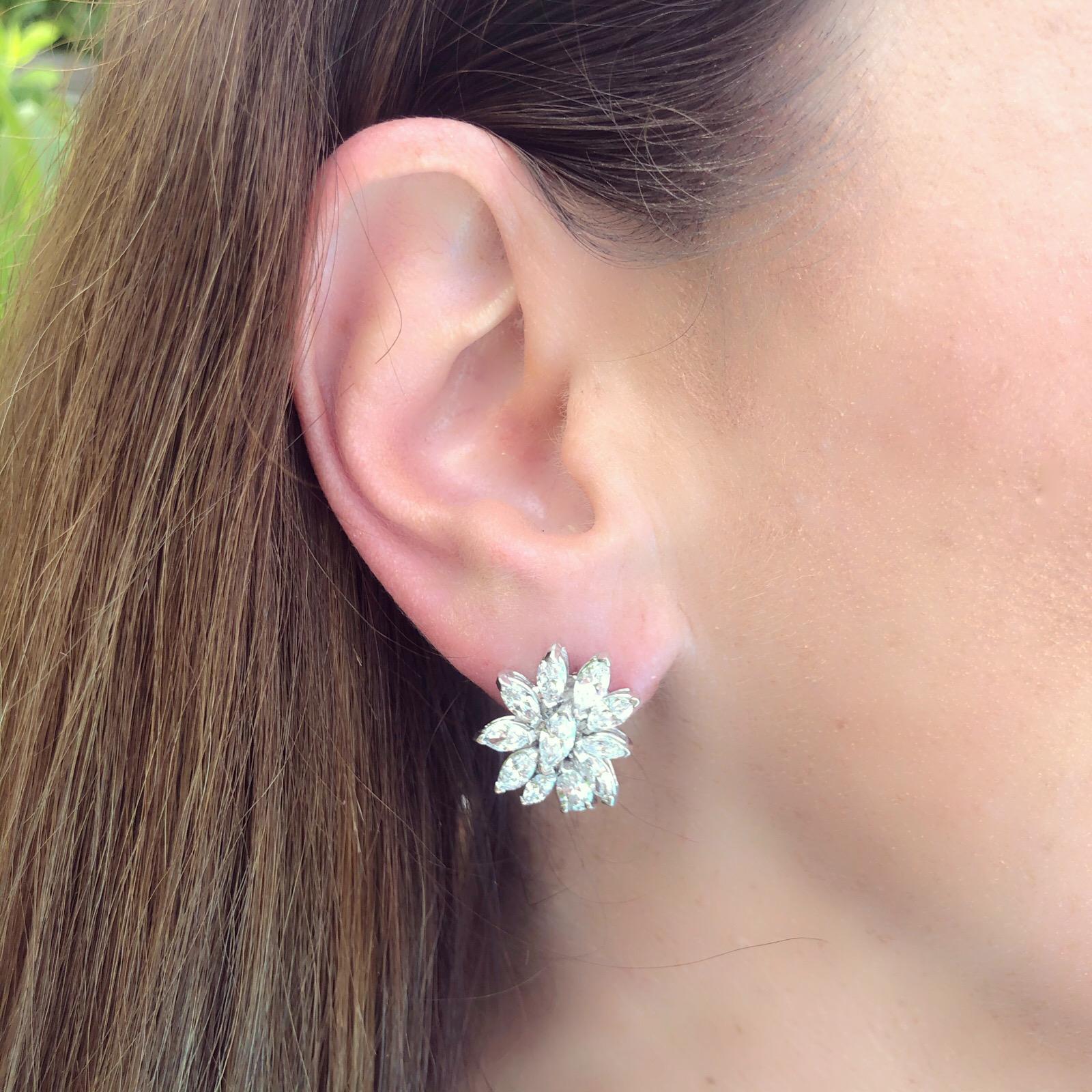 A classic look for a night out on the town. These platinum earrings feature 22 extremely well matched Marquise Cut Diamonds for a total carat weight of 5.50, expertly set to maximize their sparkle and brilliance. The earrings weigh 17 grams.