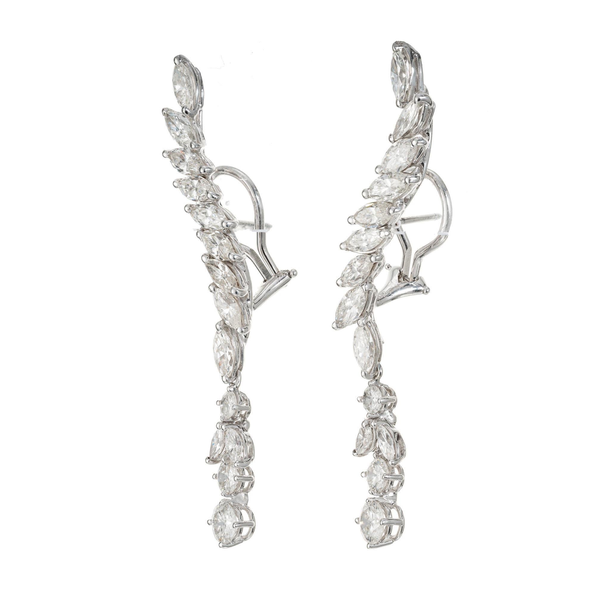 1950's Marquise and round diamond long dangle earrings in 14k white gold settings. 22 Marquise diamonds with two round dangles at the bottom. 2.40 inches long. 

22 Marquise diamonds, approx. total weight 3.60cts, H – I, SI1 – I 1
6 round diamonds,