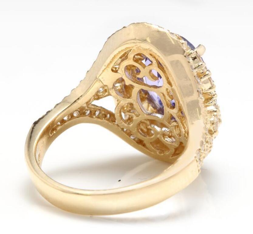 5.50 Carat Natural Splendid Tanzanite and Diamond 14 Karat Solid Gold Ring In New Condition For Sale In Los Angeles, CA