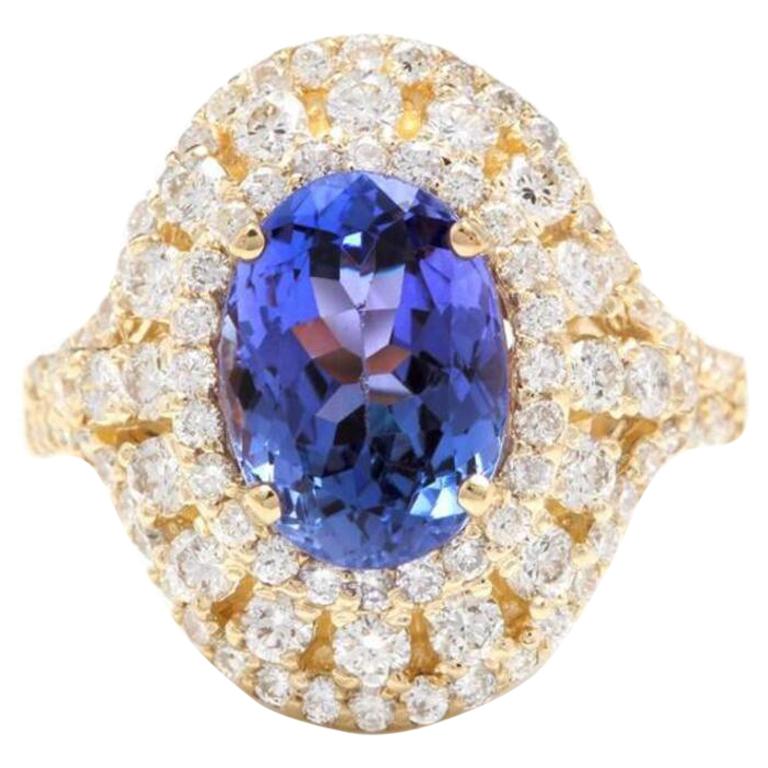 5.50 Carat Natural Splendid Tanzanite and Diamond 14 Karat Solid Gold Ring