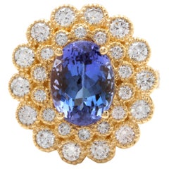 5.50 Carat Natural Tanzanite and Diamond 14 Karat Solid Yellow Gold Ring