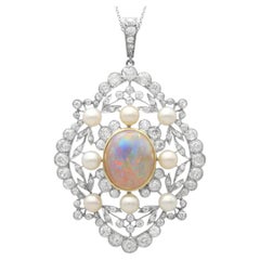5.50 Carat Opal, Natural Saltwater Pearl 8.31 Carat Diamond, Platinum Pendant