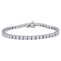 5.bracelet tennis en or blanc 14 carats avec diamants ronds et brillants de 50 carats