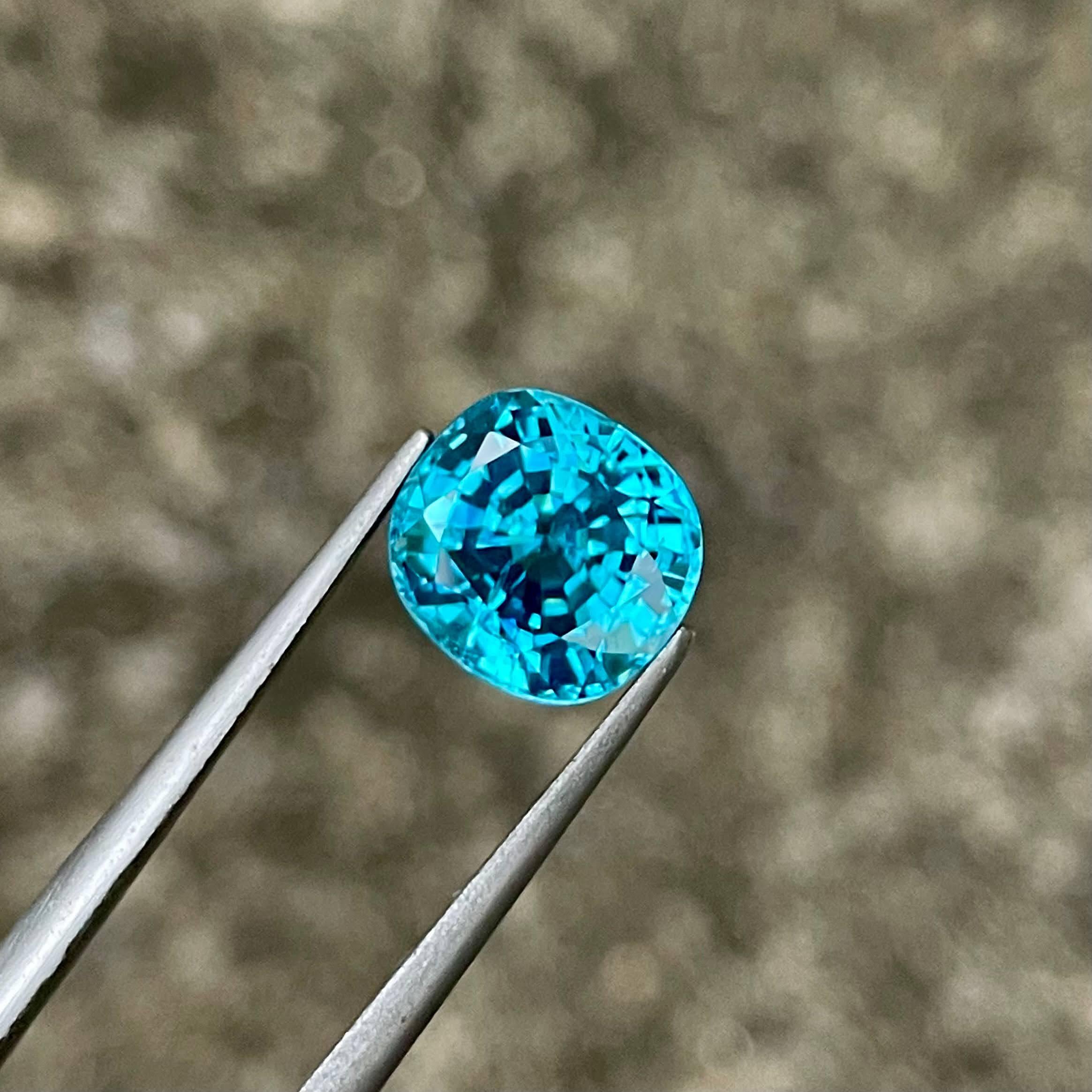 Weight 5.50 carats 
Dimensions 9.39x8.80x6.20 mm
Treatment Heated 
Origin Cambodia 
Clarity VVS
Shape cushion 
Cut fancy cushion 


This exquisite 5.50 carat Blue Zircon gemstone is a stunning example of natural beauty, sourced from the rich lands