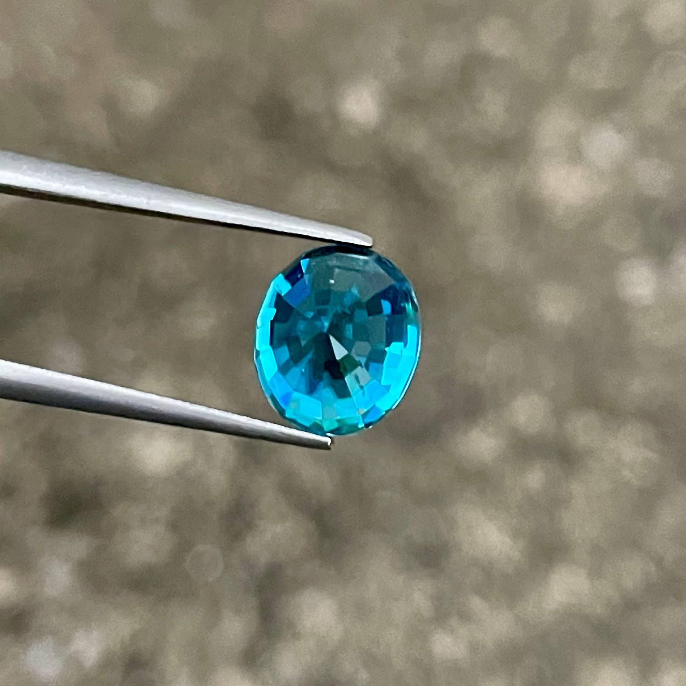 Weight 5.50 carats 
Dimensions 9.35x8.05x6.78 mm
Treatment Heated 
Origin Cambodia 
Clarity VVS
Shape oval
Cut Faceted 



This exquisite 5.50 carat Electric Blue Zircon gemstone is a stunning example of natural beauty, sourced from the rich lands