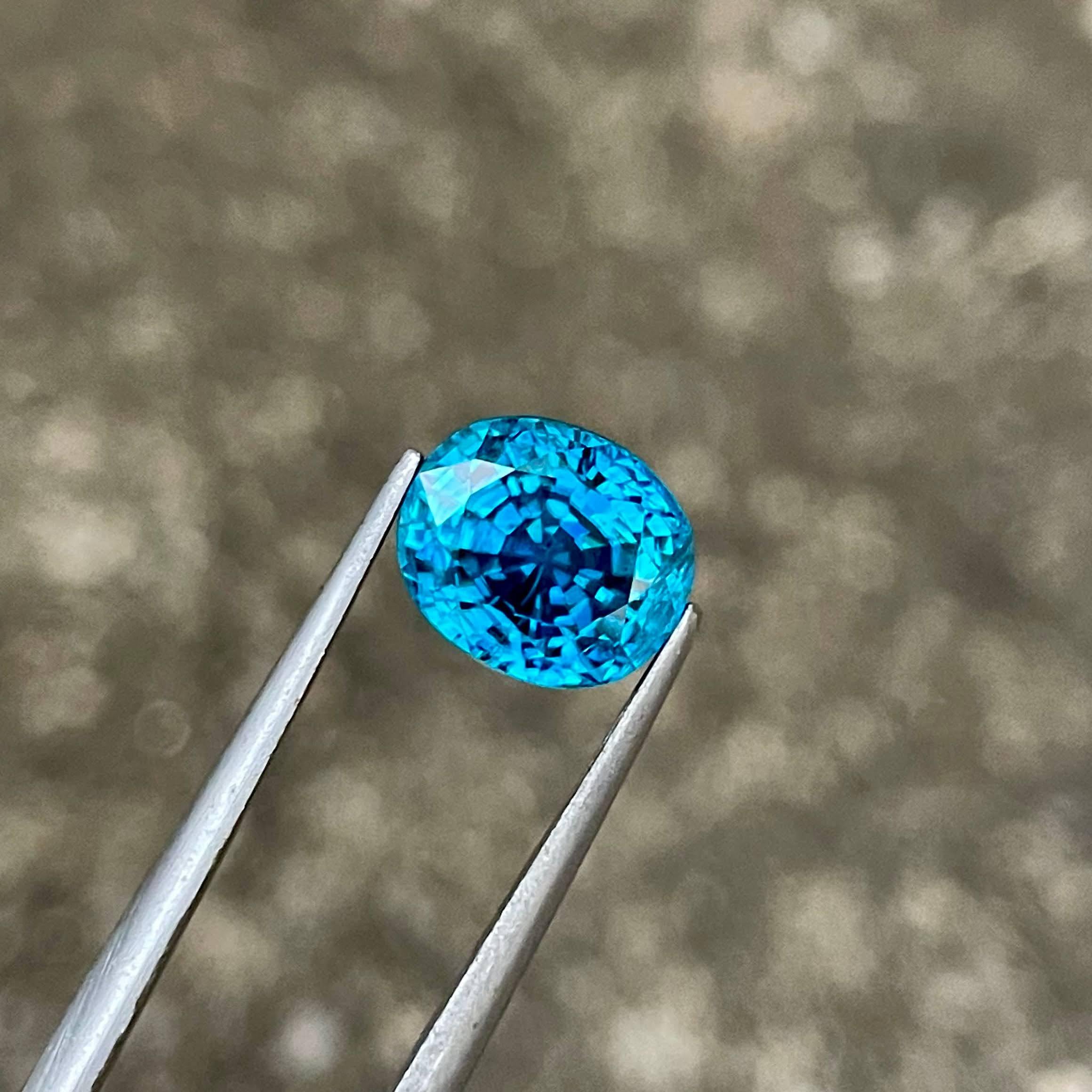 Women's or Men's 5.50 carats Electric Blue Zircon Stone Oval Cut Cambodian Gemstone For Sale