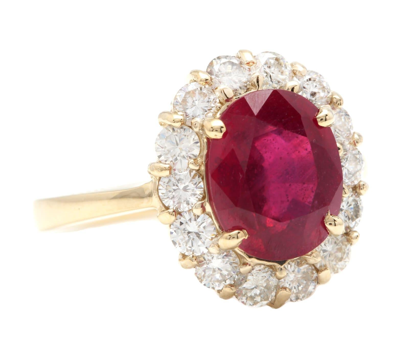 5.50 Carats Impressive Red Ruby and Natural Diamond 14K Yellow Gold Ring

Suggested Replacement Value: Approx. $5,000.00

Total Red Ruby Weight is: Approx. 4.50 Carats

Ruby Treatment: Lead Glass Filling

Ruby Measures: Approx. Approx. 10.00 x