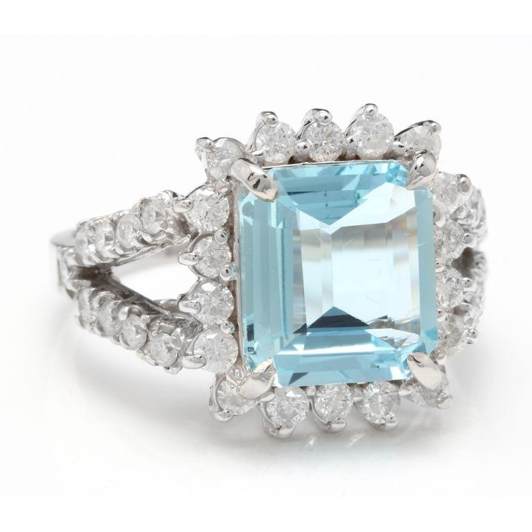 5.50 Carats Natural Aquamarine and Diamond 14K Solid White Gold Ring

Total Natural Emerald Cut Aquamarine Weights: Approx. 4.00 Carats (Heated)

Natural Round Diamonds Weight: Approx. 1.50 Carats (color G-H / Clarity SI1-SI2)

Ring size: 6.5 (we