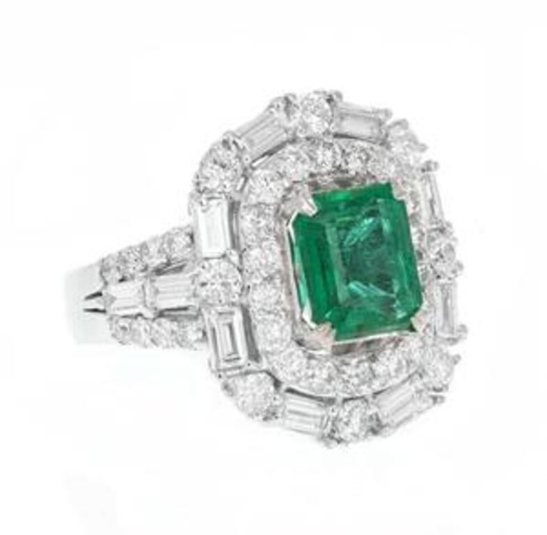 5.50 Carats Natural Emerald and Diamond 18K Solid White Gold Ring

Total Natural Green Emerald Weight is: Approx. 2.80 Carats (transparent)

Emerald Measures: Approx. 9 x 8mm

Emerald Treatment: Oiling

Natural Round & Baguette Diamonds Weight: