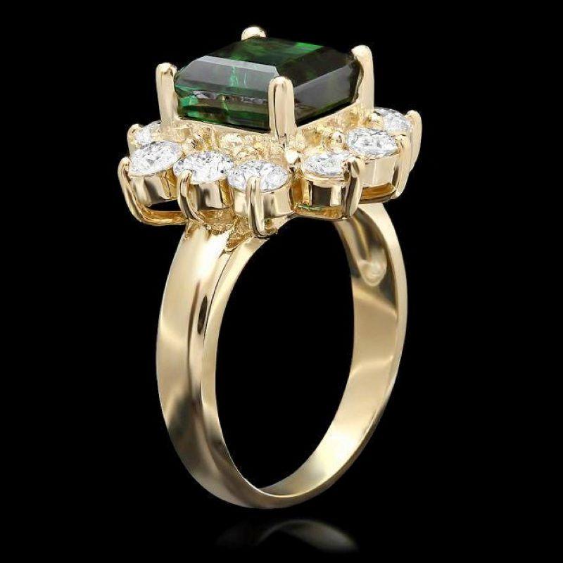 5.50 Carats Natural Green Tourmaline and Diamond 14K Solid Yellow Gold Ring

Total Natural Tourmaline Weight is: Approx. 3.90 Carats 

Tourmaline Measures: Approx. 8.00 x 8.00mm

Natural Round Diamonds Weight: 1.60 Carats (color G-H / Clarity