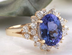5.50 Carat Natural Tanzanite and Diamond 14 Karat Solid Yellow Gold Ring