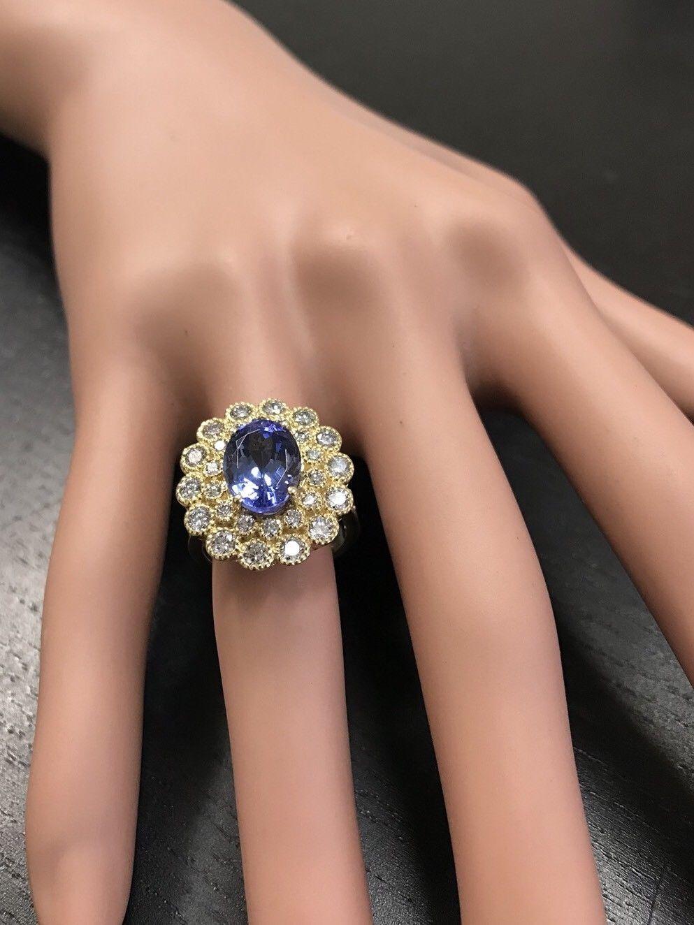 Bague en or jaune massif 14 carats avec tanzanite naturelle de 5,50 carats et diamants en vente 2