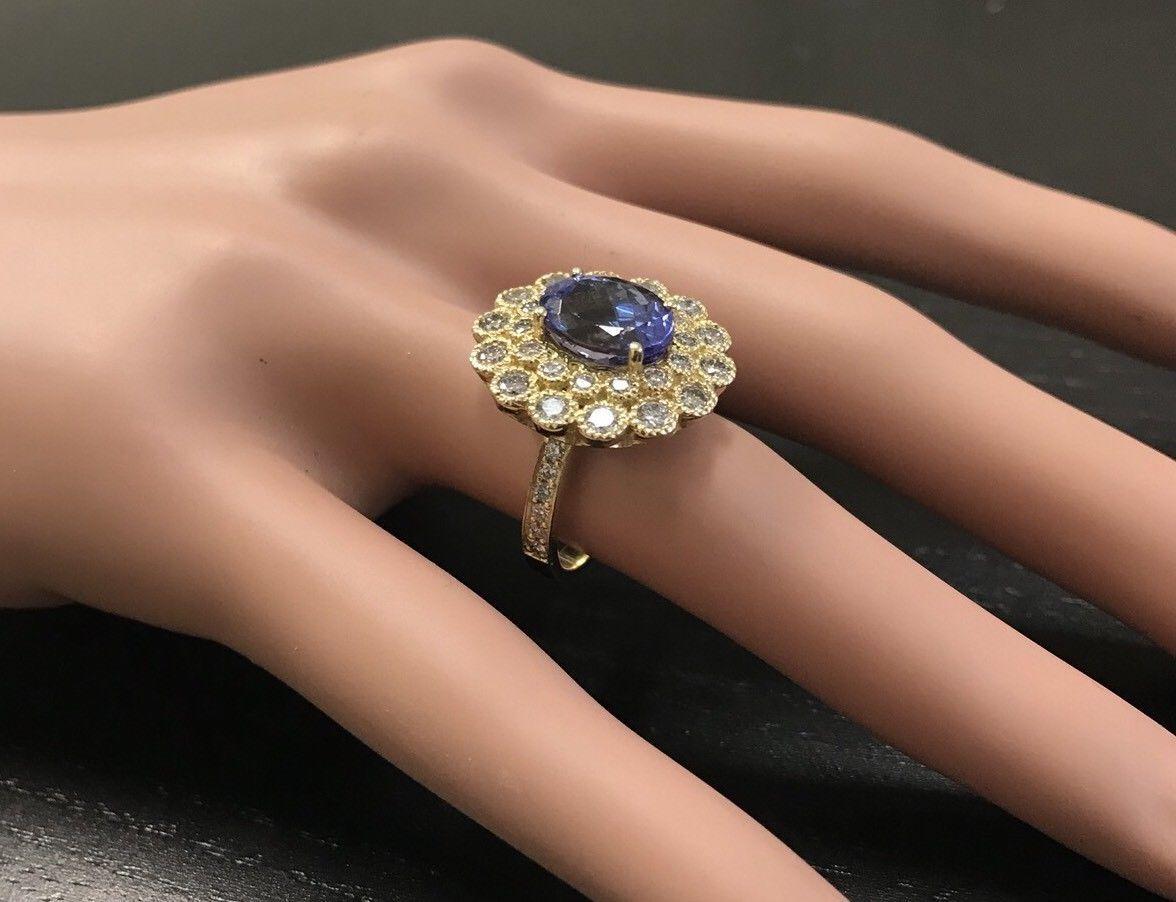 Bague en or jaune massif 14 carats avec tanzanite naturelle de 5,50 carats et diamants en vente 3