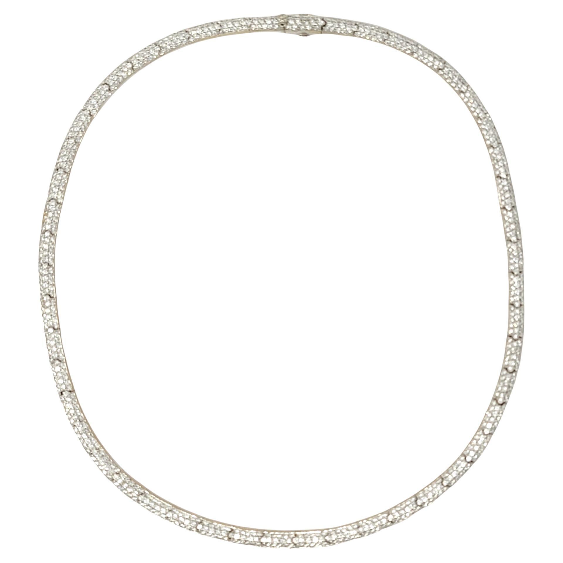 Strikingly beautiful minimalist choker style necklace. It is stunningly simple in design, with curved lines and glittering pave diamonds, making the piece absolutely glow! This lovely necklace features a series of solid 14 karat white gold bar links
