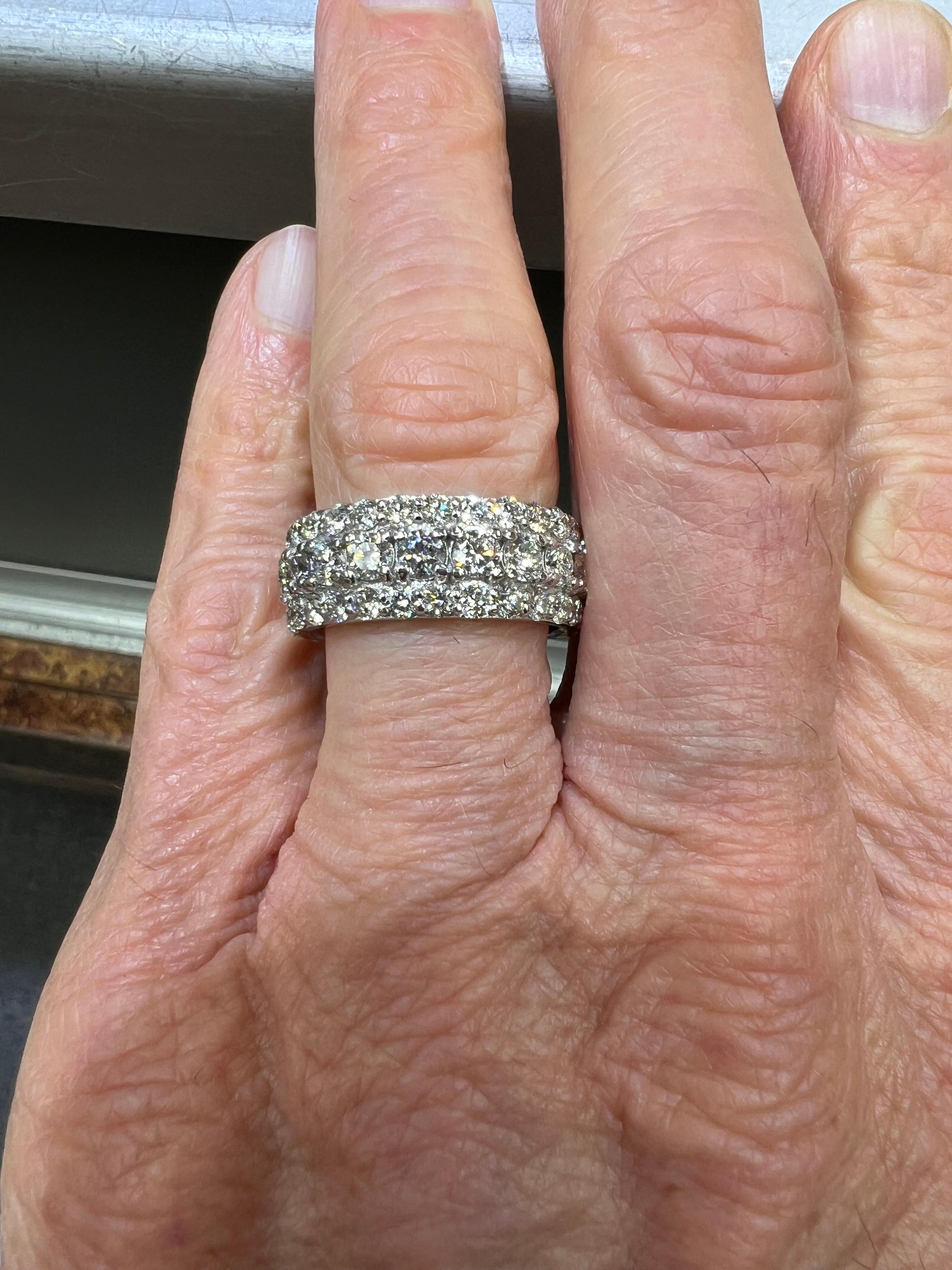 Contemporary 5.50 Carats TW Diamond Eternity Three Row White Gold Band Ring Size 9.25 For Sale