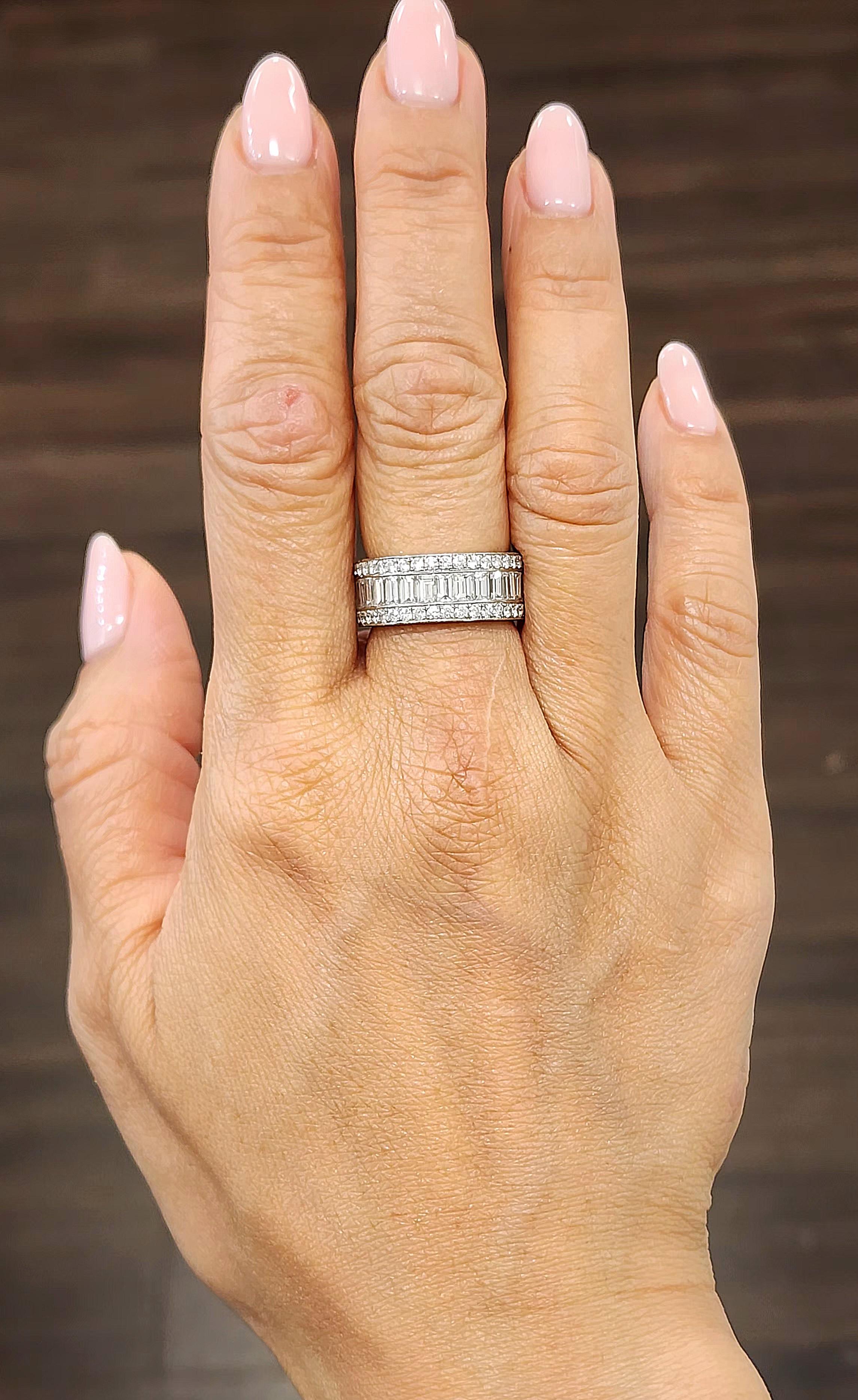 This stunning diamond eternity band weighs 5.50 ct set in 18k white gold. The diamonds on the band boasts an F/G in color and VS1/VS2 in clarity. A gorgeous ring to wear everyday or with any wardrobe. 