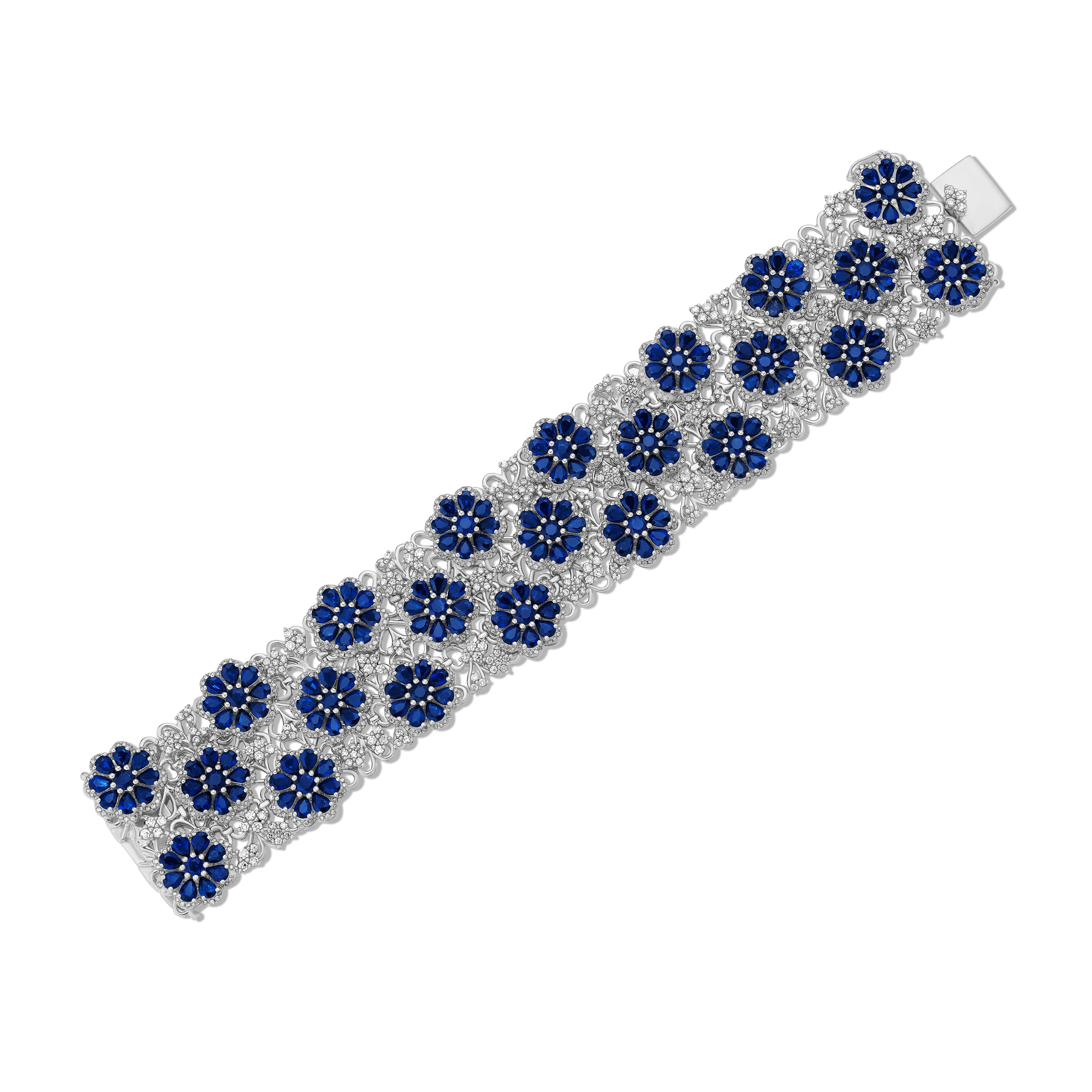 •	A truly exquisite combination of blue sapphires & white diamond encircles the wrist in this one-of-a-kind bracelet. Comprised with over 55 carats of sapphires and diamonds, this bracelet was made to depict the elegance and beauty of nature and