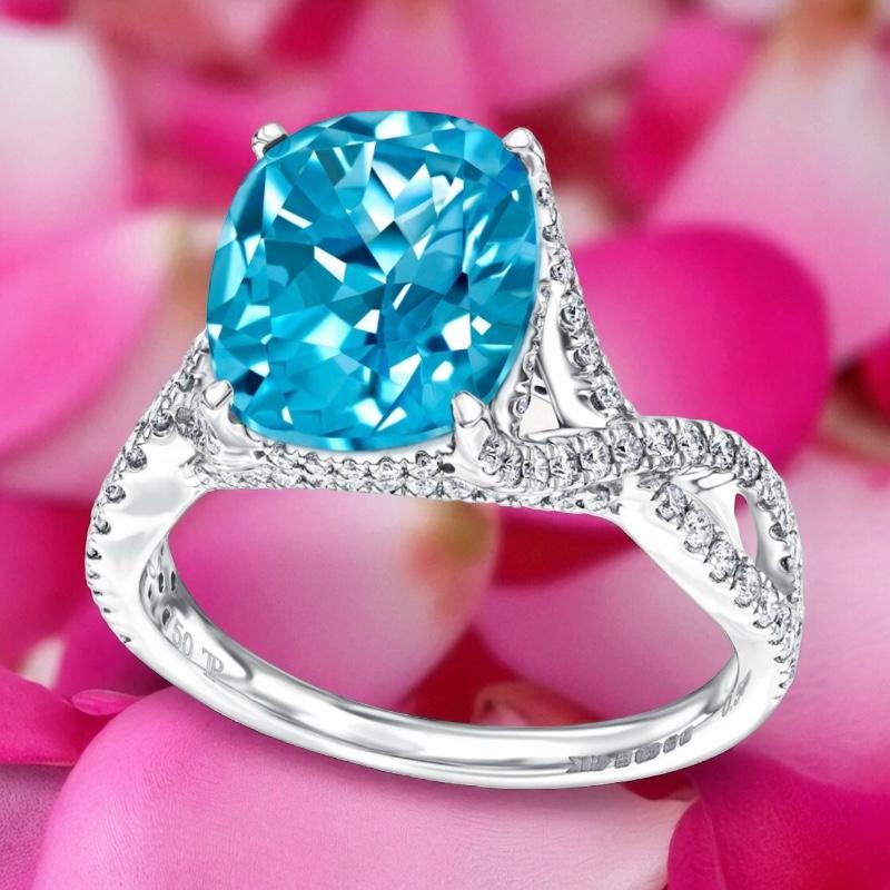 Anillo de compromiso de topacio azul en cojín de 5,50 quilates Diamante redondo de 0,66 quilates en oro de 18 quilates en venta 4