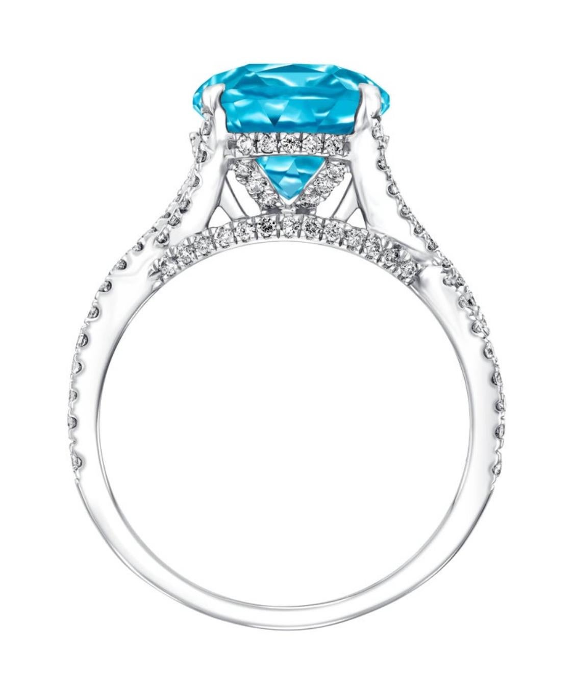 Anillo de compromiso de topacio azul en cojín de 5,50 quilates Diamante redondo de 0,66 quilates en oro de 18 quilates en venta 6