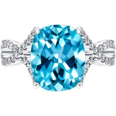 5.50ct Cushion Blue Topaz Engagement Ring 0.66 Carat Round Diamond in 18ct Gold