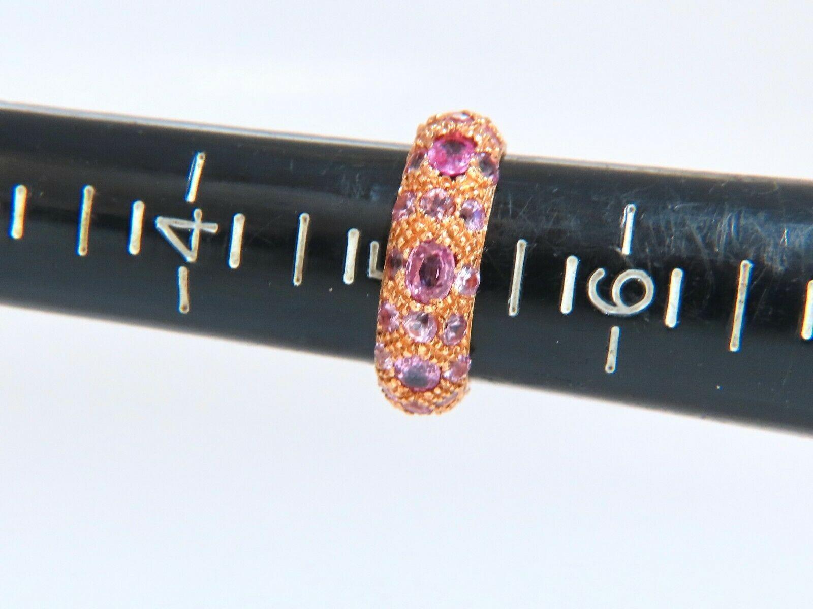 5 1/2 carat natural pink sapphires eternity ring.

Clean clarity vivid Pink transparent full cut brilliant.

Ring measures 6.4 mm wide

Depth of ring 3mm

14 karat rose gold 4.2 grams

Size 5