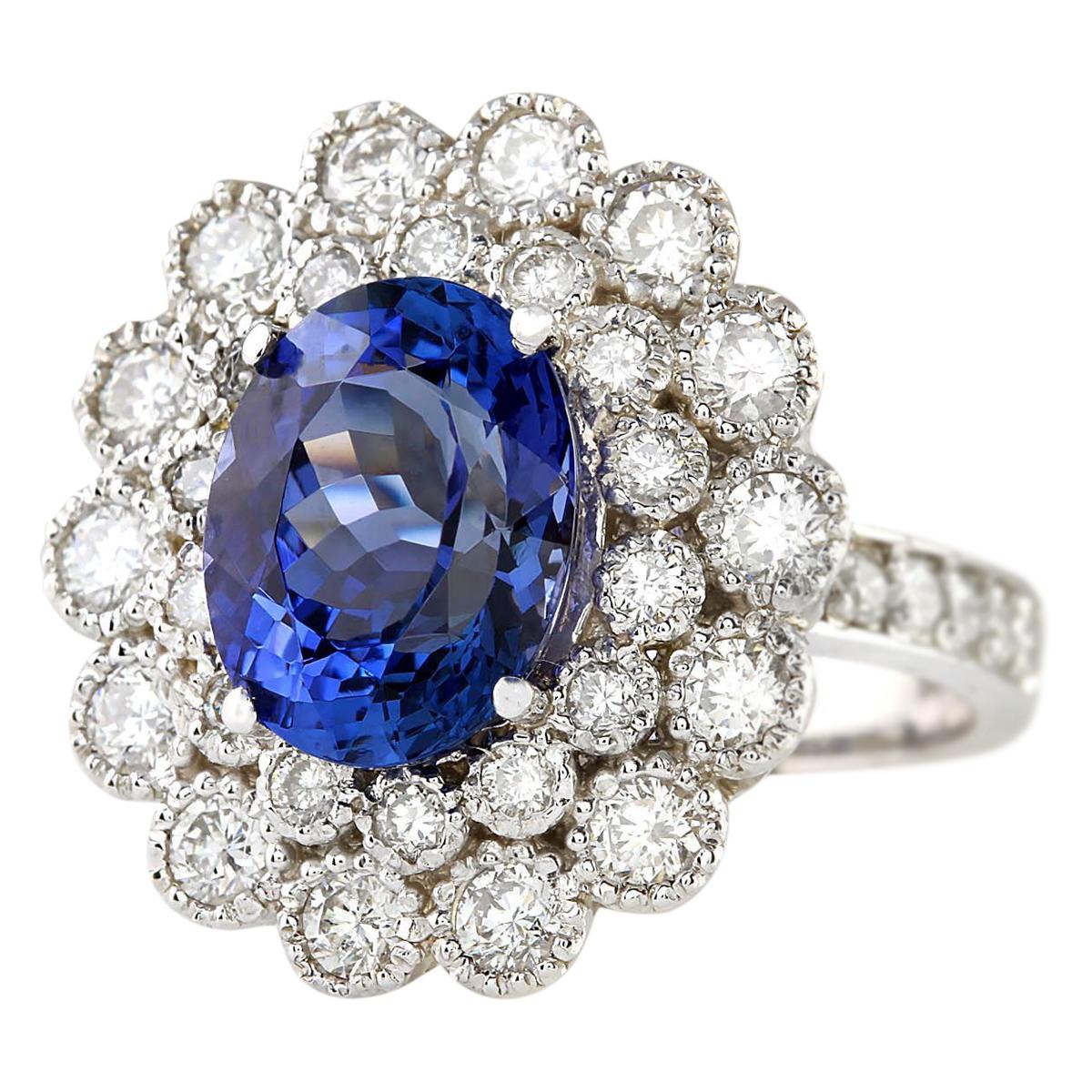 5.51 Carat Natural Tanzanite 14 Karat White Gold Diamond Ring
Stamped: 14K White Gold
Total Ring Weight: 8.7 Grams
Total Natural Tanzanite Weight is 4.31 Carat (Measures: 11.00x9.00 mm)
Color: Blue
Total Natural Diamond Weight is 1.20