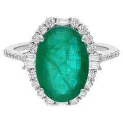 Zambian Emerald and Diamond Halo Ring, 5.51 Carat Emerald, 18K White Gold