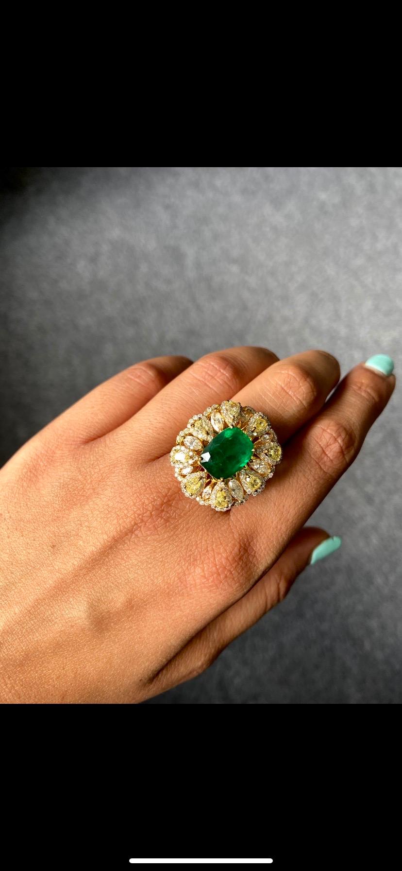 Modern 5.52 Carat Emerald and Yellow Diamond 18k Cocktail Ring