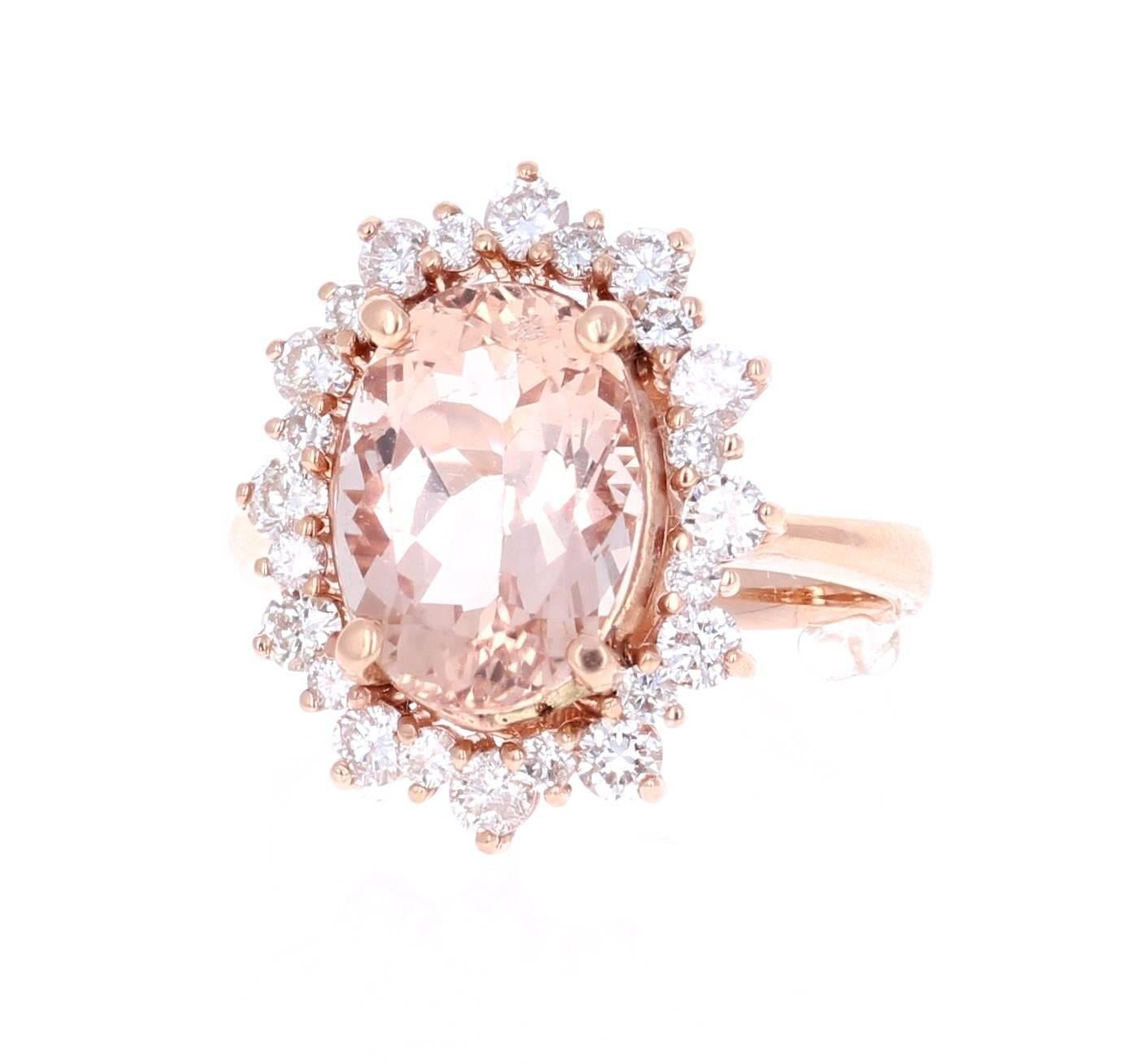 This classic Morganite Ring has an Oval Cut 4.49 Carat Morganite (9.5mm x 12.5mm) as its center and is surrounded by 24 Round Cut Diamonds that weigh 1.03 Carats. The clarity and color of the diamonds are SI-F. The total carat weight of the ring is