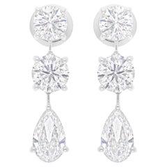 Pendientes de diamantes talla brillante pera redondos SI/H de 5,52 quilates y 18 quilates de oro blanco