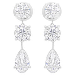 Pendientes de diamantes talla brillante pera redondos SI/H de 5,52 quilates y 18 quilates de oro blanco