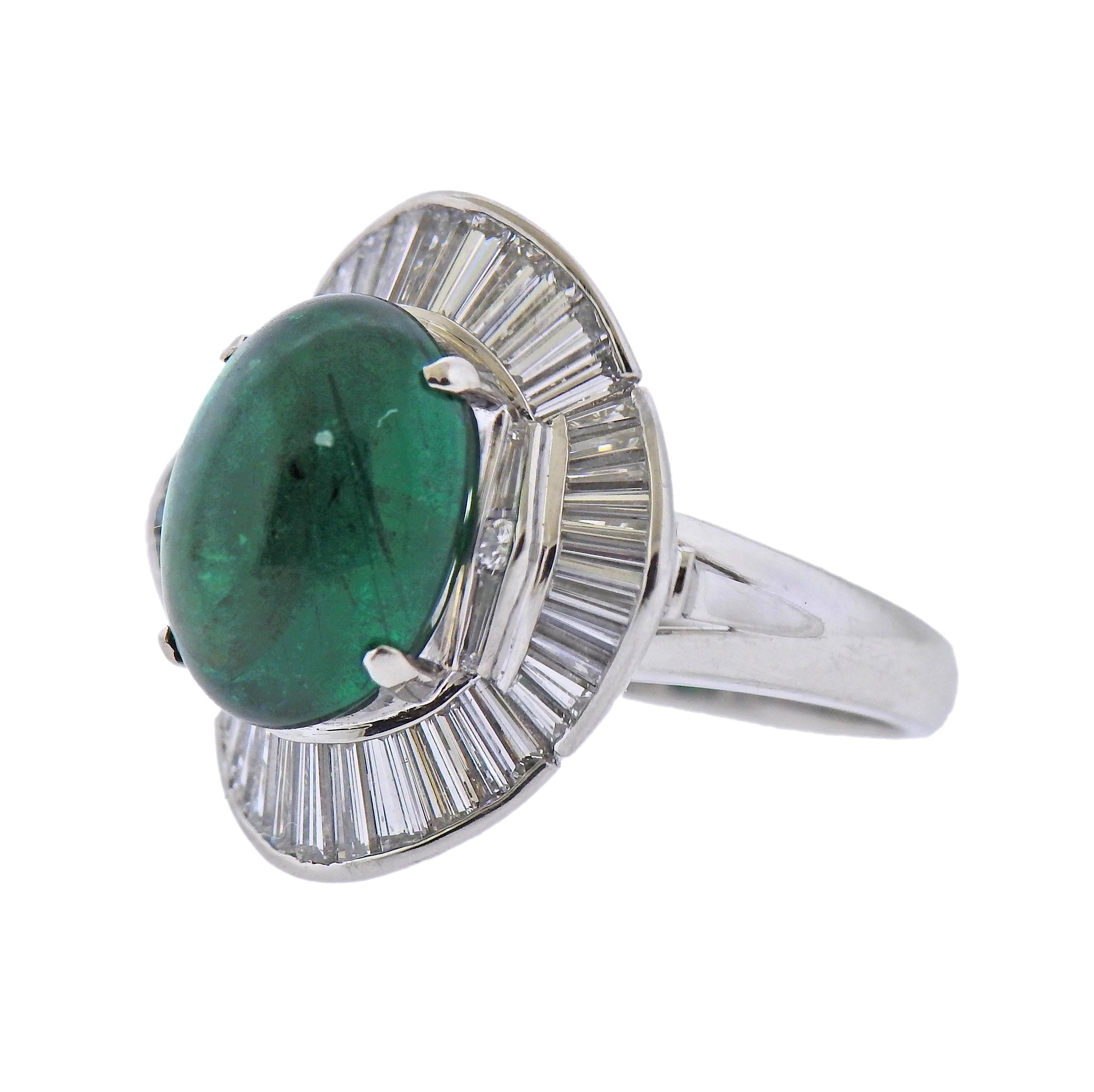 Platinum cocktail ring, with 5.53ct oval emerald cabochon, surrounded with 1.89ctw in diamonds. Ring size - 6, ring top - 21mm x 20mm. Marked: R5.53, D1.89, pt900. Weight - 13.2 grams.