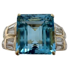 5.53 Carat Fine Blue Emerald Cut Aquamarine
Baguette Diamond 18k Gold Ring 5.53 Carat Fine Blue Emerald Cut Aquamarine
Baguette Diamond 18k Gold Ring