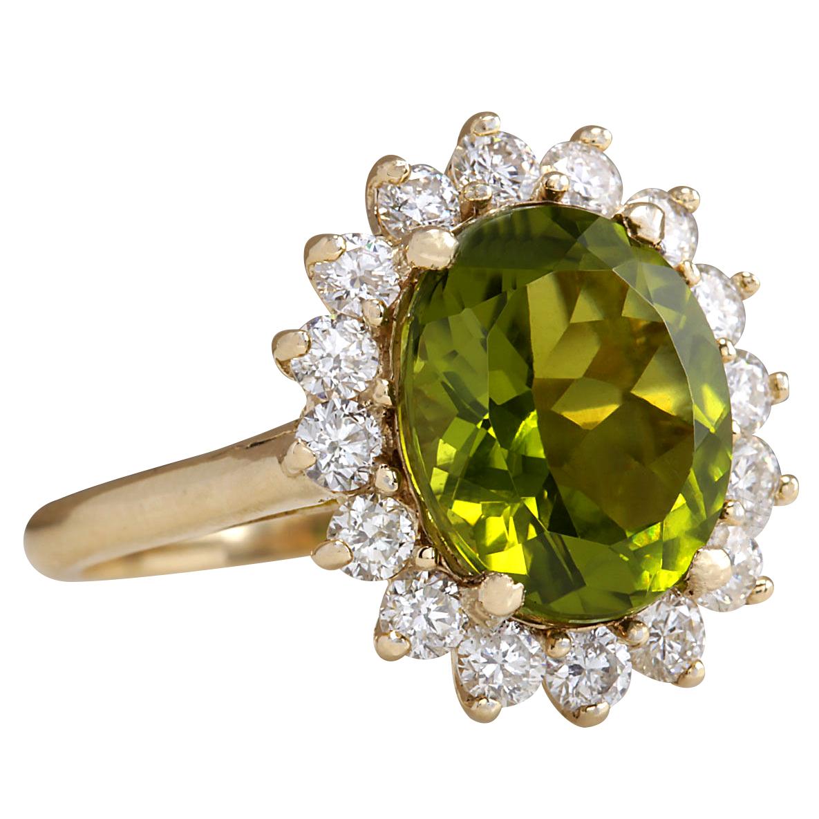 5.53 Carat Natural Peridot 14 Karat Yellow Gold Diamond Ring
Stamped: 14K Yellow Gold
Total Ring Weight: 5.0 Grams
Total Natural Peridot Weight is 4.47 Carat (Measures: 12.00x10.00 mm)
Color: Green
Total Natural Diamond Weight is 1.06 Carat
Color: