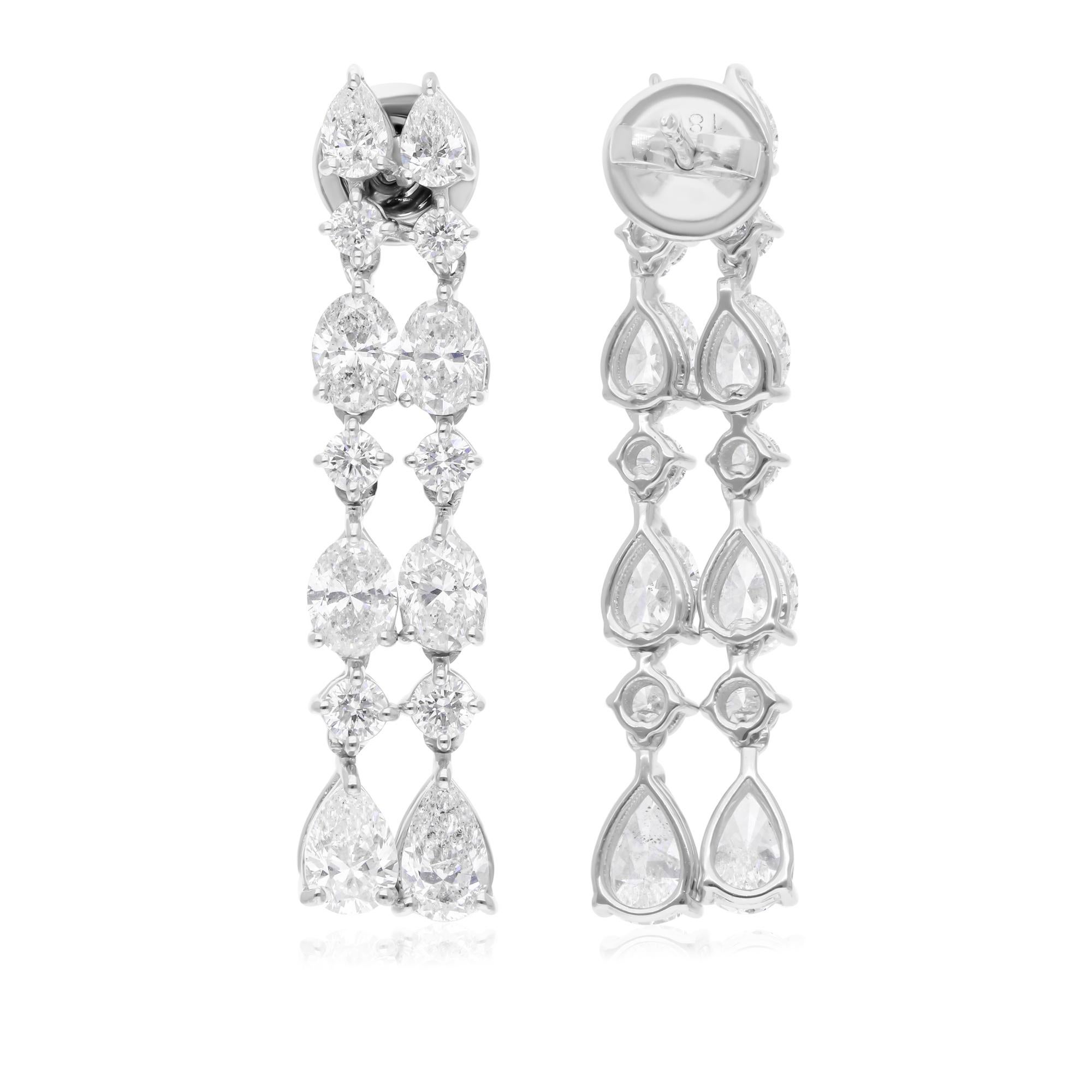 Coulées dans de l'or 18 carats, ces boucles d'oreilles exquises sont serties de 5,53 carats de diamants étincelants.

Suivez la vitrine de Spectrum Jewels pour découvrir la dernière collection et les pièces exclusives. Spectrum Jewels est fièrement