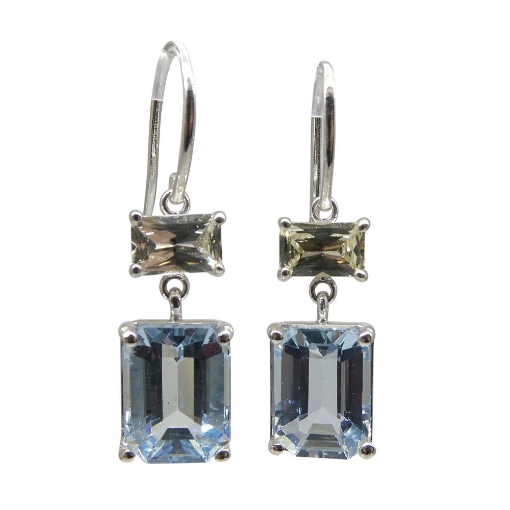 The mesmerizing pair of Blue Aquamarine take center stage with their step-cutting style on both crown and pavilion, allowing light to gracefully dance within, creating an enchanting visual spectacle. Classified as very slightly included, this