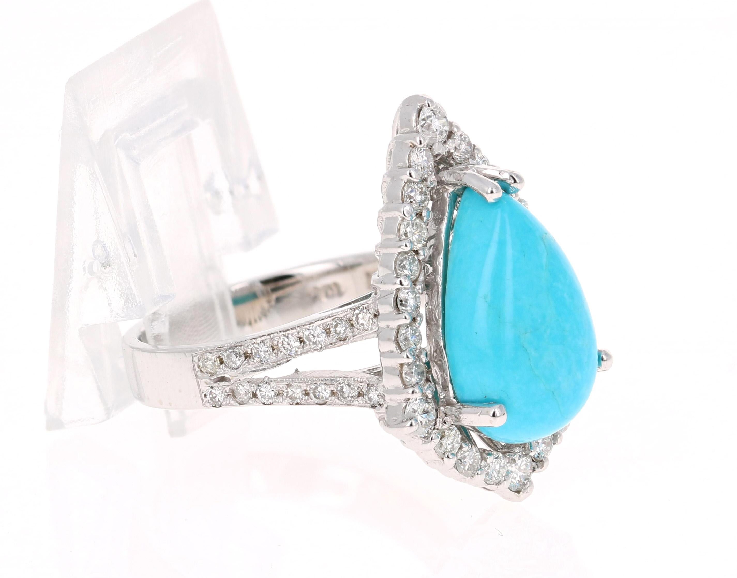 
The Pear Cut Turquoise is 4.53 Carats and is surrounded by a cluster of beautifully set diamonds. There are 50 Round Cut Diamonds that weigh 1.01 Carats. The total carat weight of the ring is 5.54 Carats. 

The ring is crafted in 14 Karat White
