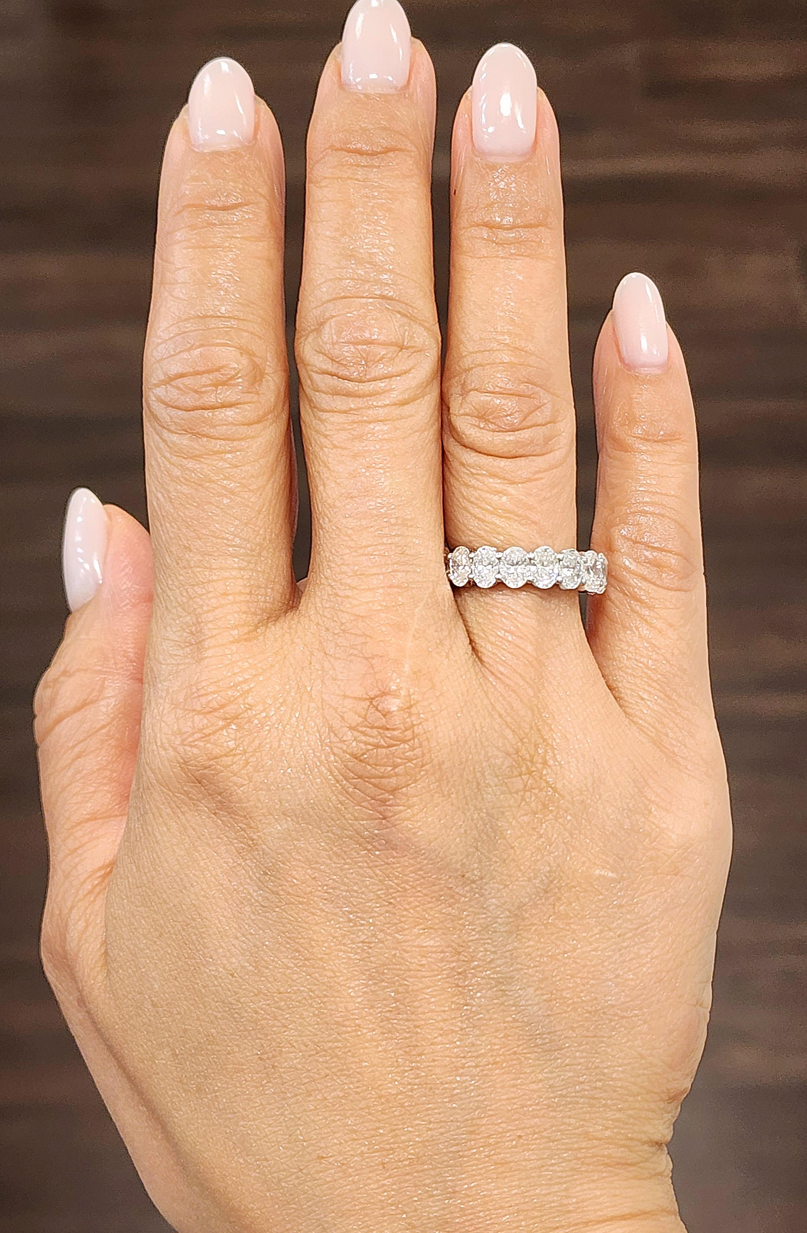 This gorgeous oval diamond eternity band set in the 