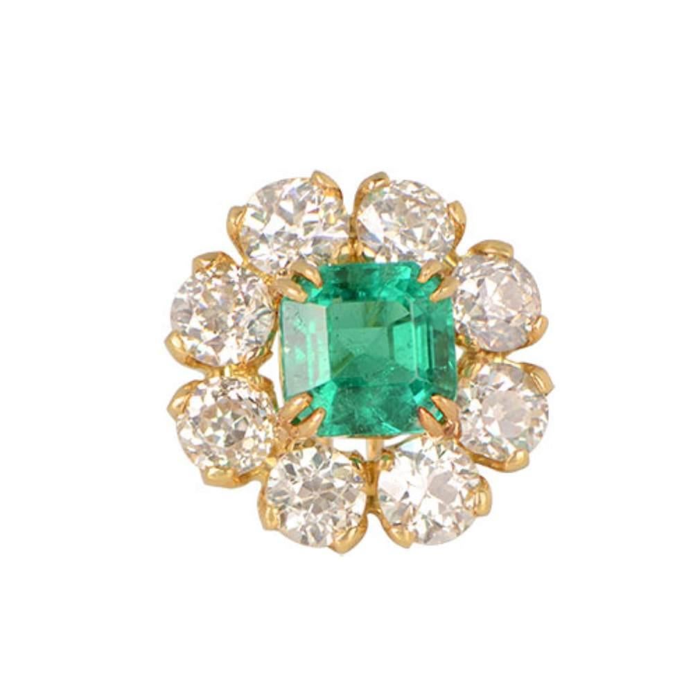 Indulge in the enchanting beauty of these emerald-cut emerald earrings, where vintage elegance merges with a captivating allure. Weighing a total of 5.54 carats, the emeralds radiate a mesmerizing richness in their lush green hue, capturing