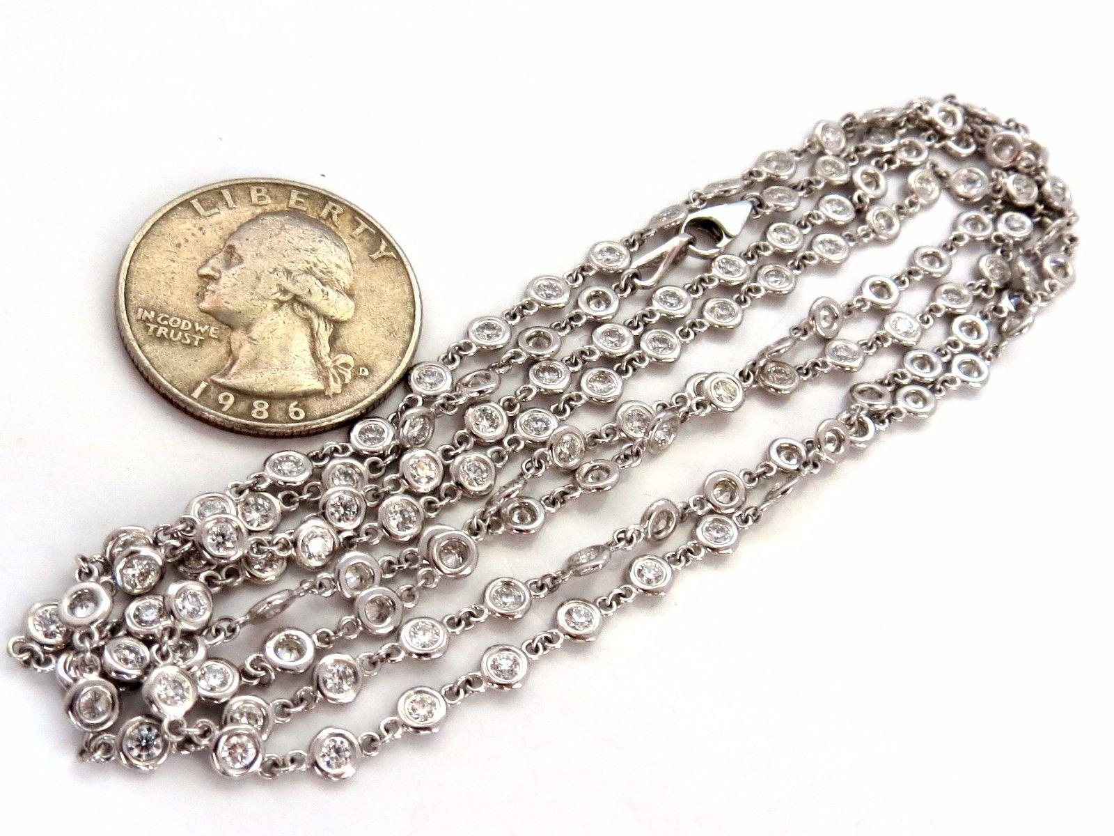 5.55ct. Diamonds Station By Yard Necklace.
Double Wrap Version.


Natural Rounds, Full cuts.
F/G colors

Vs-2 clarity.


124 diamonds total count.

Total Necklace Length: 35.5 Inch.

14Kt White gold 

15 Grams

Diamonds mounted flush / smooth