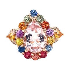 Cocktailring aus Roségold mit 5.55 Karat rosa Morganit, Diamant und Saphir