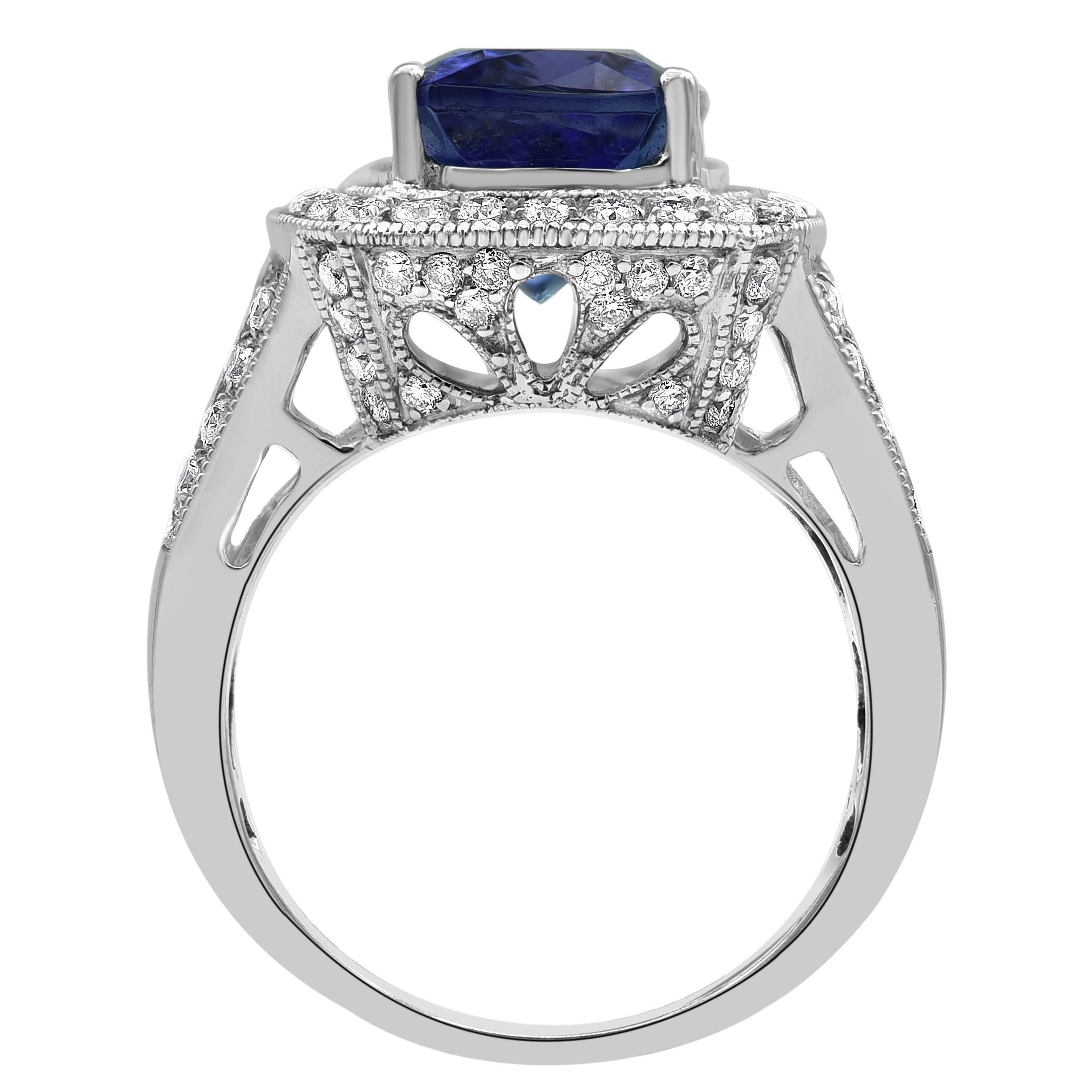 Cushion Cut 5.55 Carat Tanzanite & 0.55 Carat Diamond 14K White Prong Set Ring For Sale