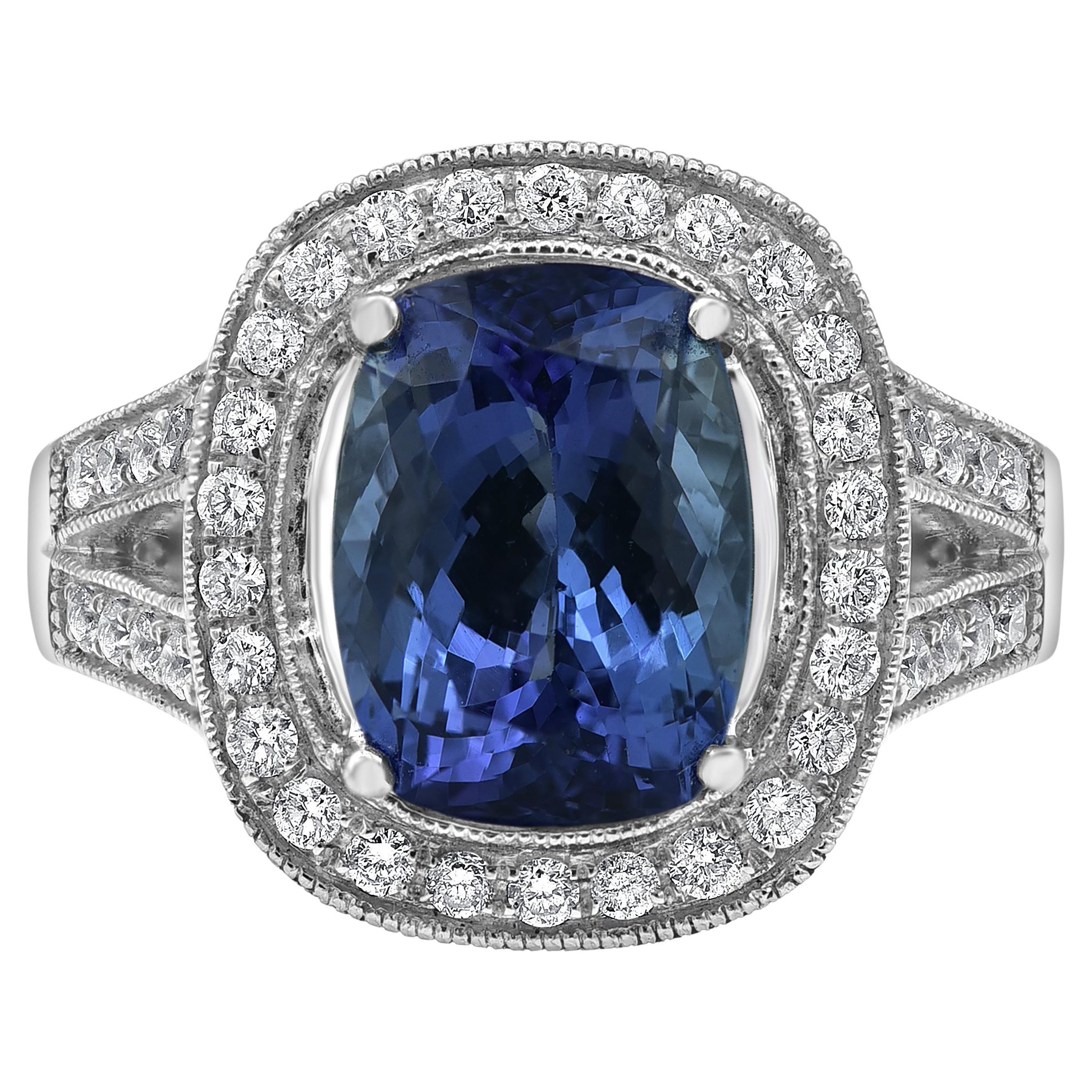 5.55 Carat Tanzanite & 0.55 Carat Diamond 14K White Prong Set Ring For Sale