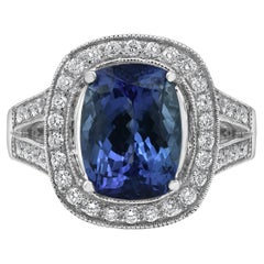 Bague en or blanc 14 carats sertie d'une tanzanite de 5,55 carats et d'un diamant de 0,55 carat