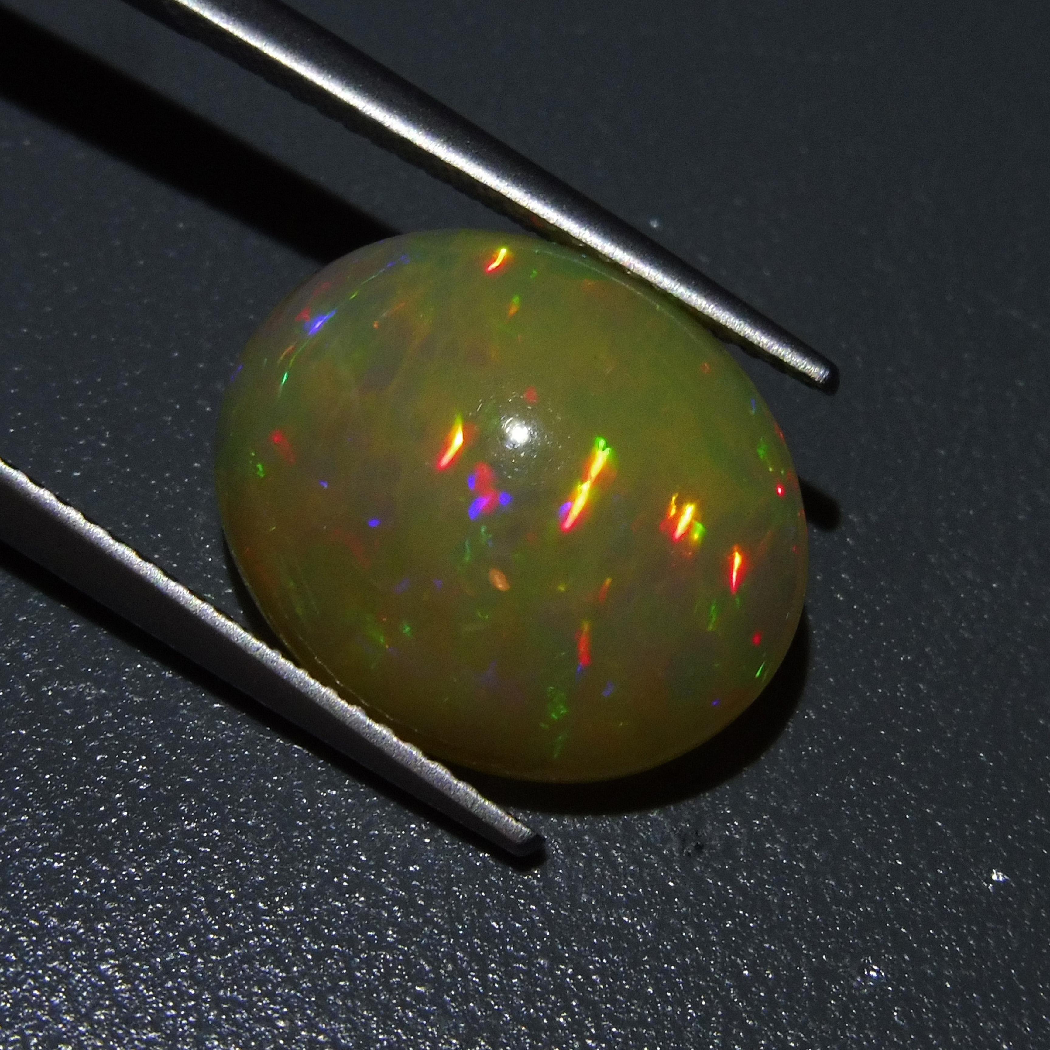 Oval Cut 5.55 ct Oval Cabochon Opal For Sale