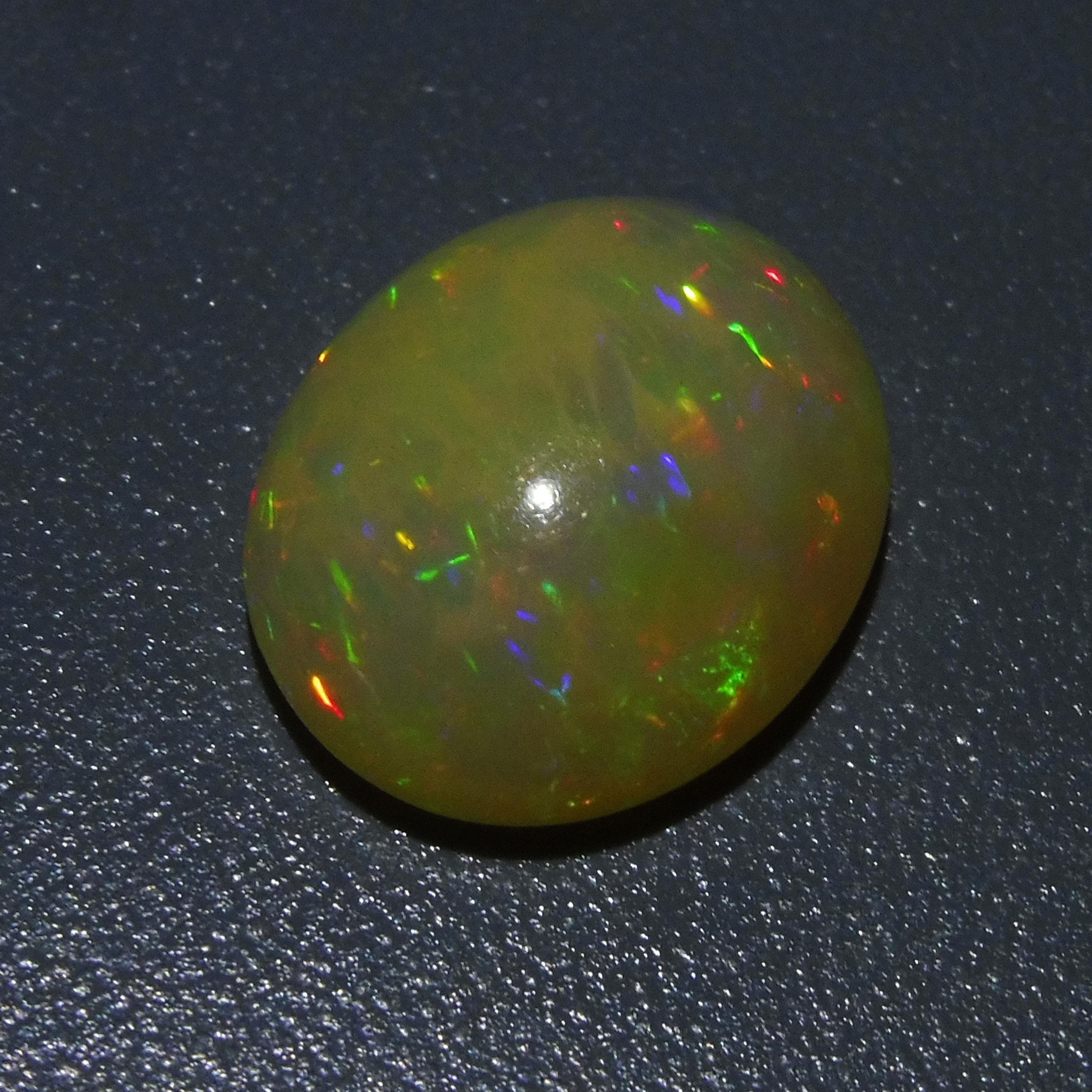 Women's or Men's 5.55 ct Oval Cabochon Opal For Sale