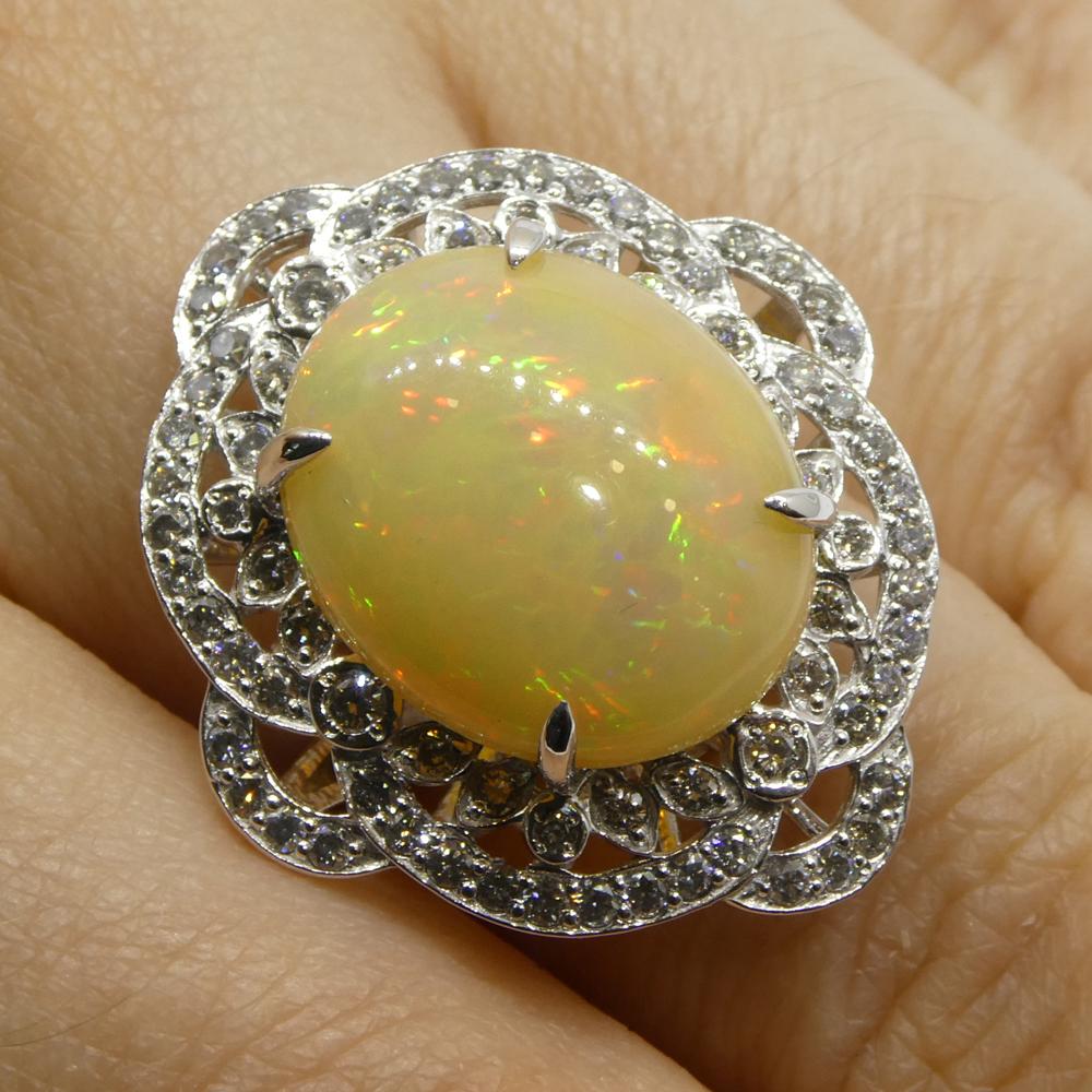 Presenting a 5.55ct Opal and Diamond Ballerina Cocktail or Engagement Ring, meticulously crafted in platinum. At Skyjems, our three-generation legacy is woven into every creation, reflecting our unwavering commitment to exceptional quality. This