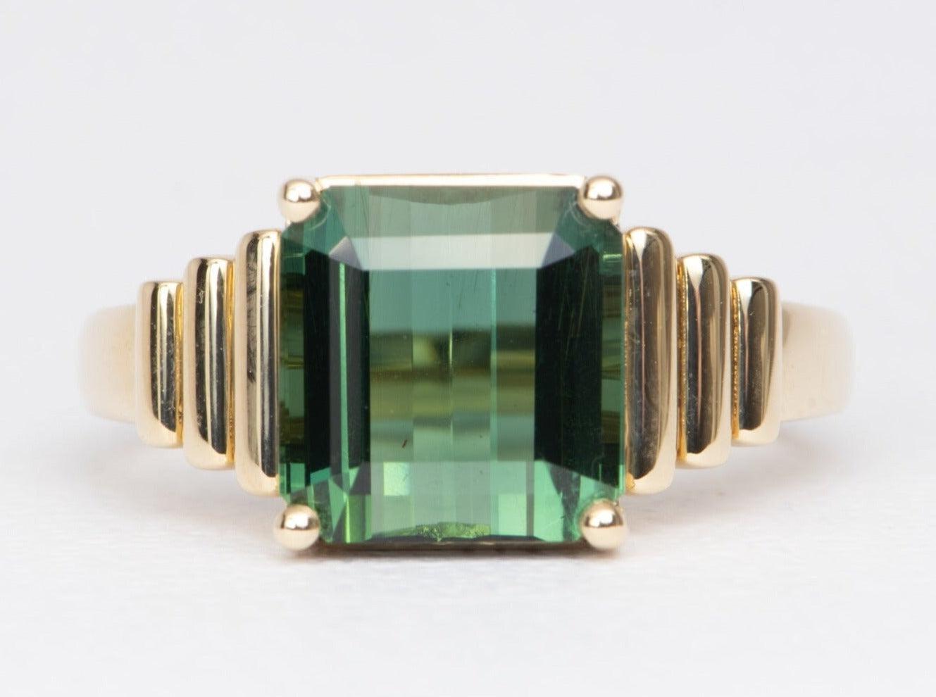 ♥ Solid 14k yellow gold ring set with a beautiful tourmaline in a wide ribbed design
♥ Gorgeous green color!
♥ The item measures 10.2 mm in length, 9.6 mm in width, and stands 7.3 mm from the finger

♥ US Size 8 (Free resizing up or down 1 size)
♥