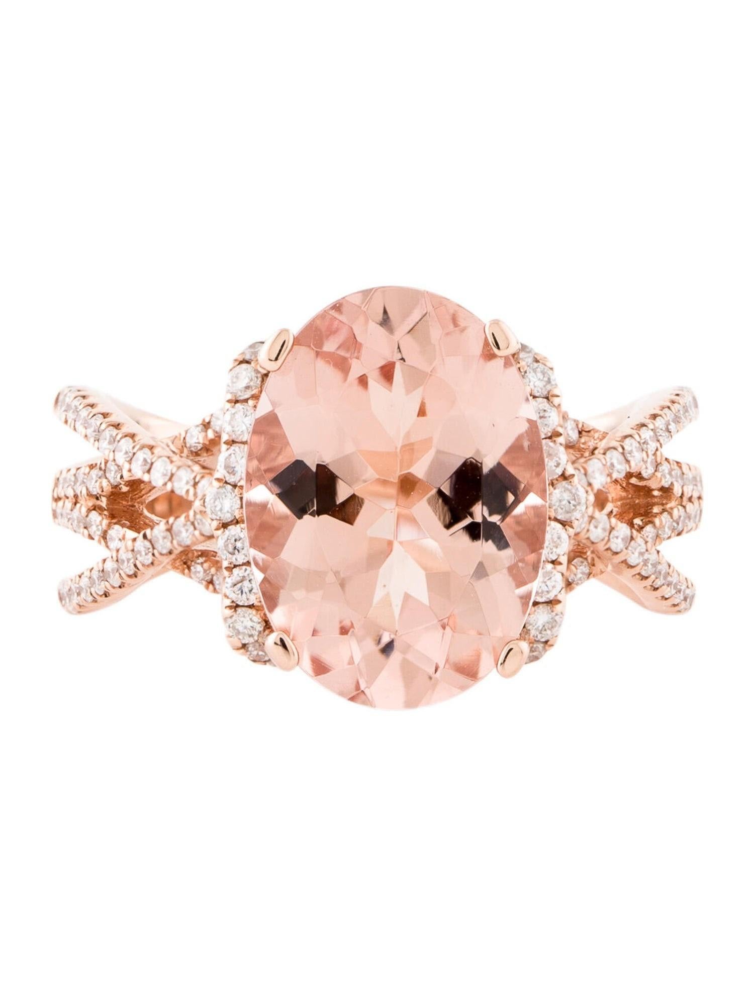 This is a magnificent natural morganite and diamond ring set in solid 14K rose gold. The natural 14X10MM Morganite oval has an excellent peachy pink color (AAA quality gem) and is set on top of a gorgeous diamond encrusted shank. The ring is stamped