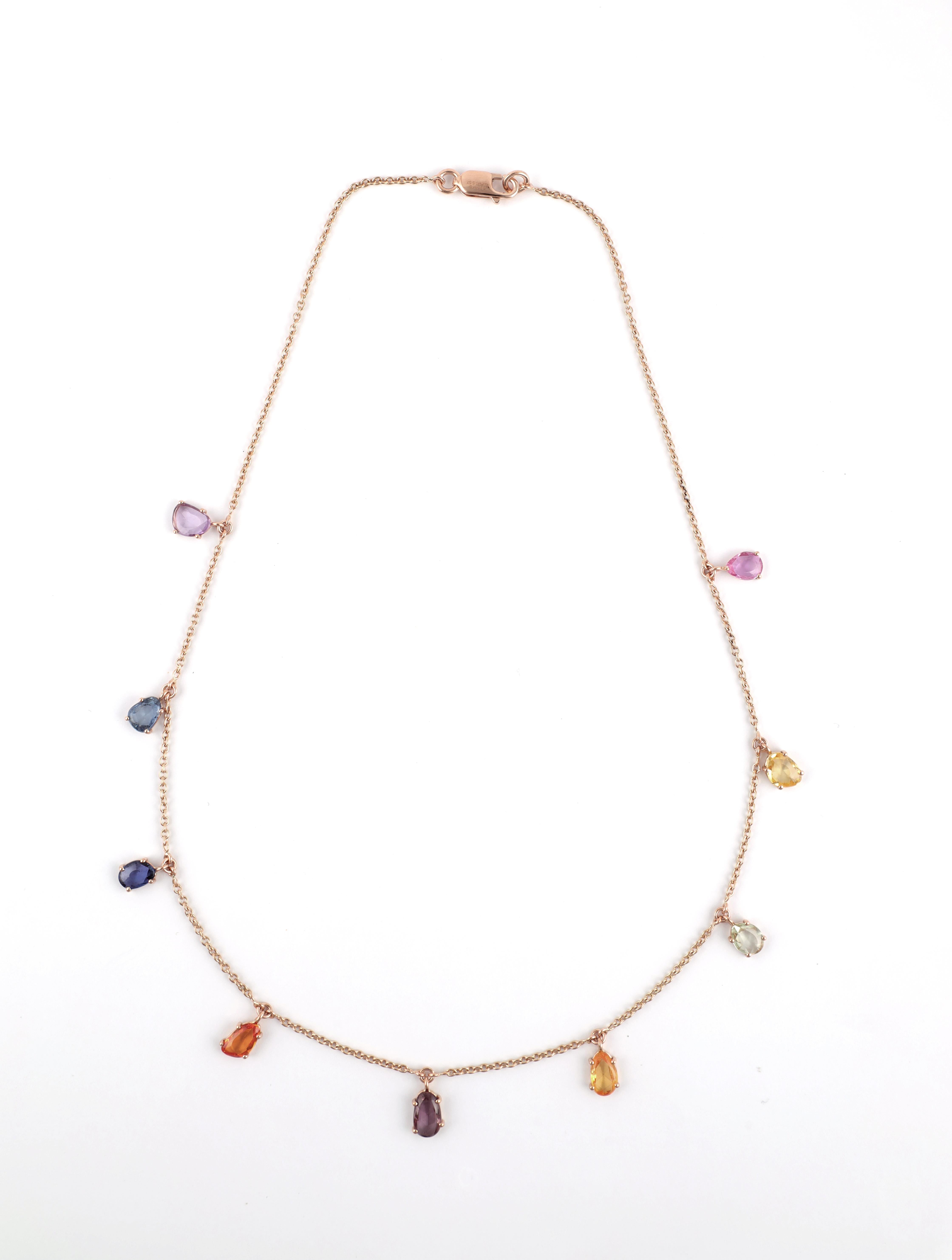 Multi-Colors Rainbow Sapphire  Chain Necklace in 18K Rose Gold studded with mix cut sapphire pieces.
Accessorize your look with this elegant Blue sapphire chain necklace. This stunning piece of jewelry instantly elevates a casual look or dressy